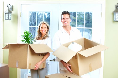Commercial movers relocating office equipment near Tottenham Green